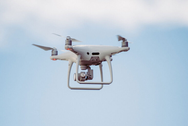 White drone in mid air